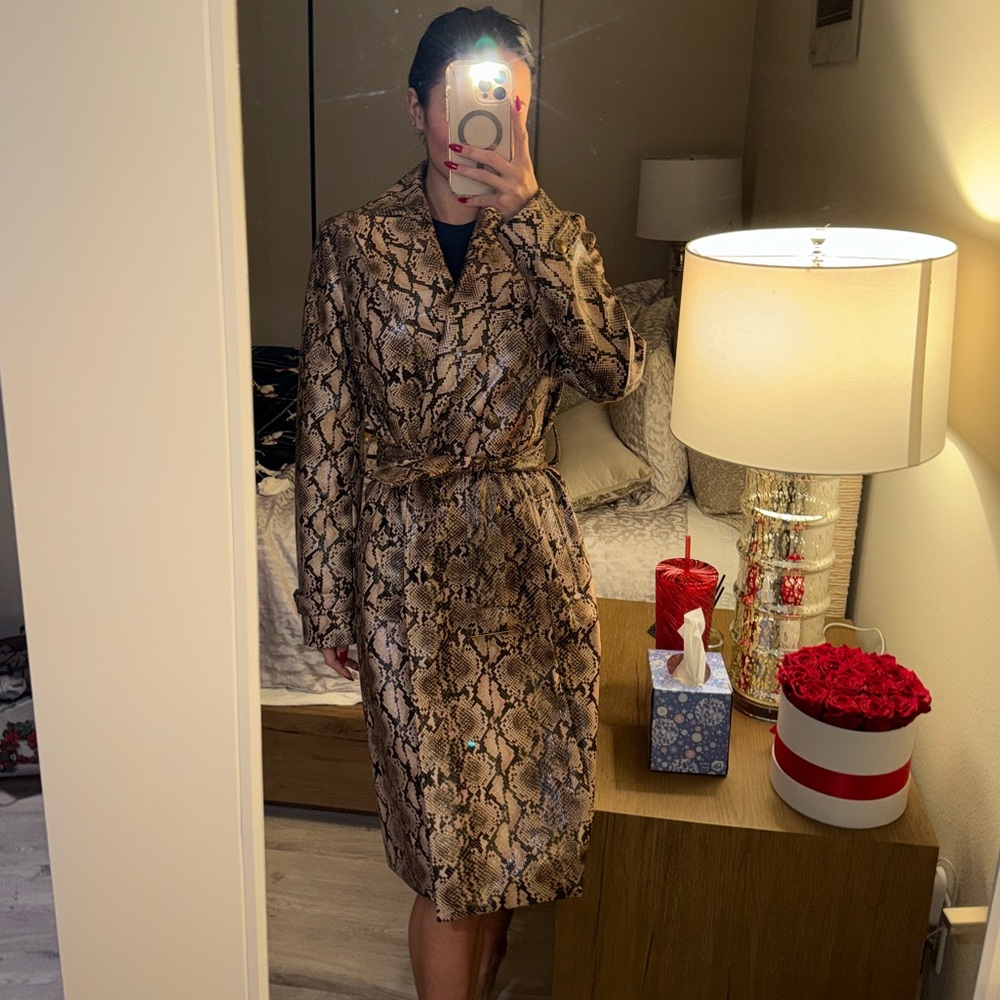 Snake print , leather jacket never worn